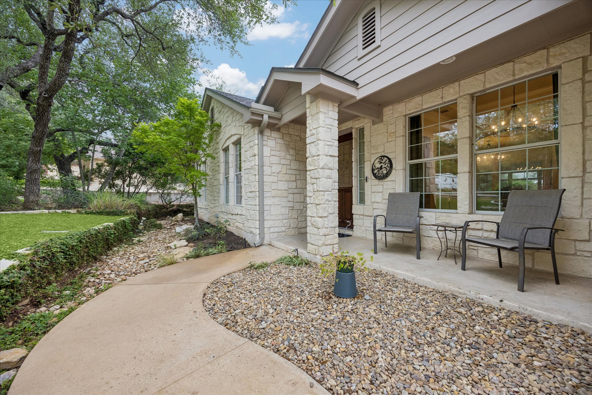 313 South Flamingo Drive Austin, TX 78734 - Photo 21 of 24 Front patio vibes!