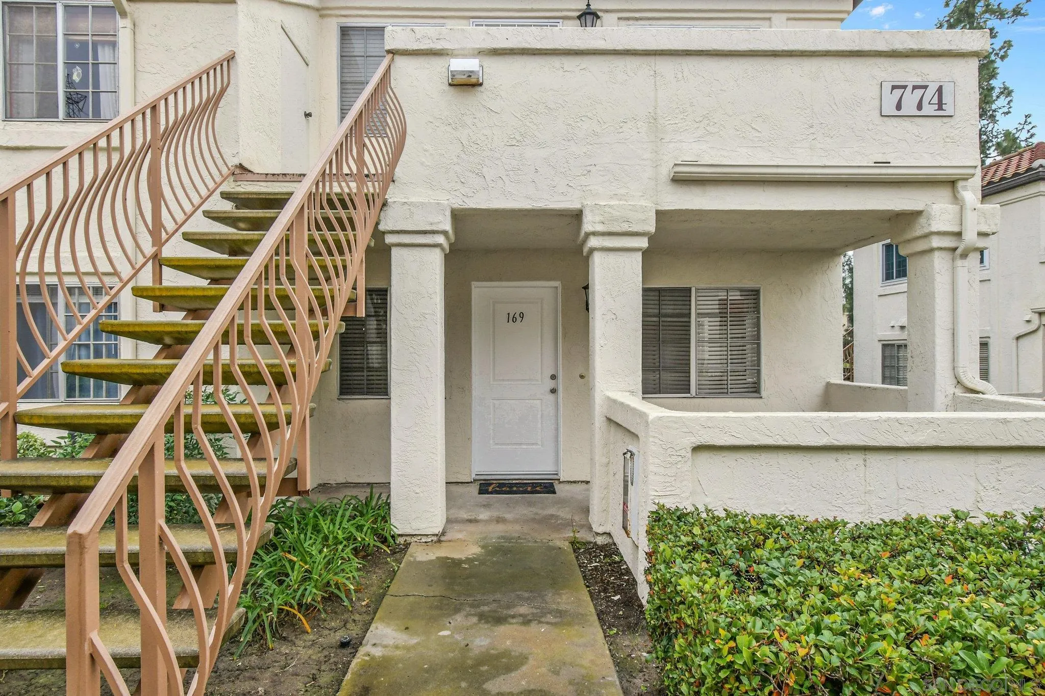 774 Eastshore Terrace, Unit 169 Chula Vista, CA 91913 - Photo 3 of 34 a view of entryway with a front door