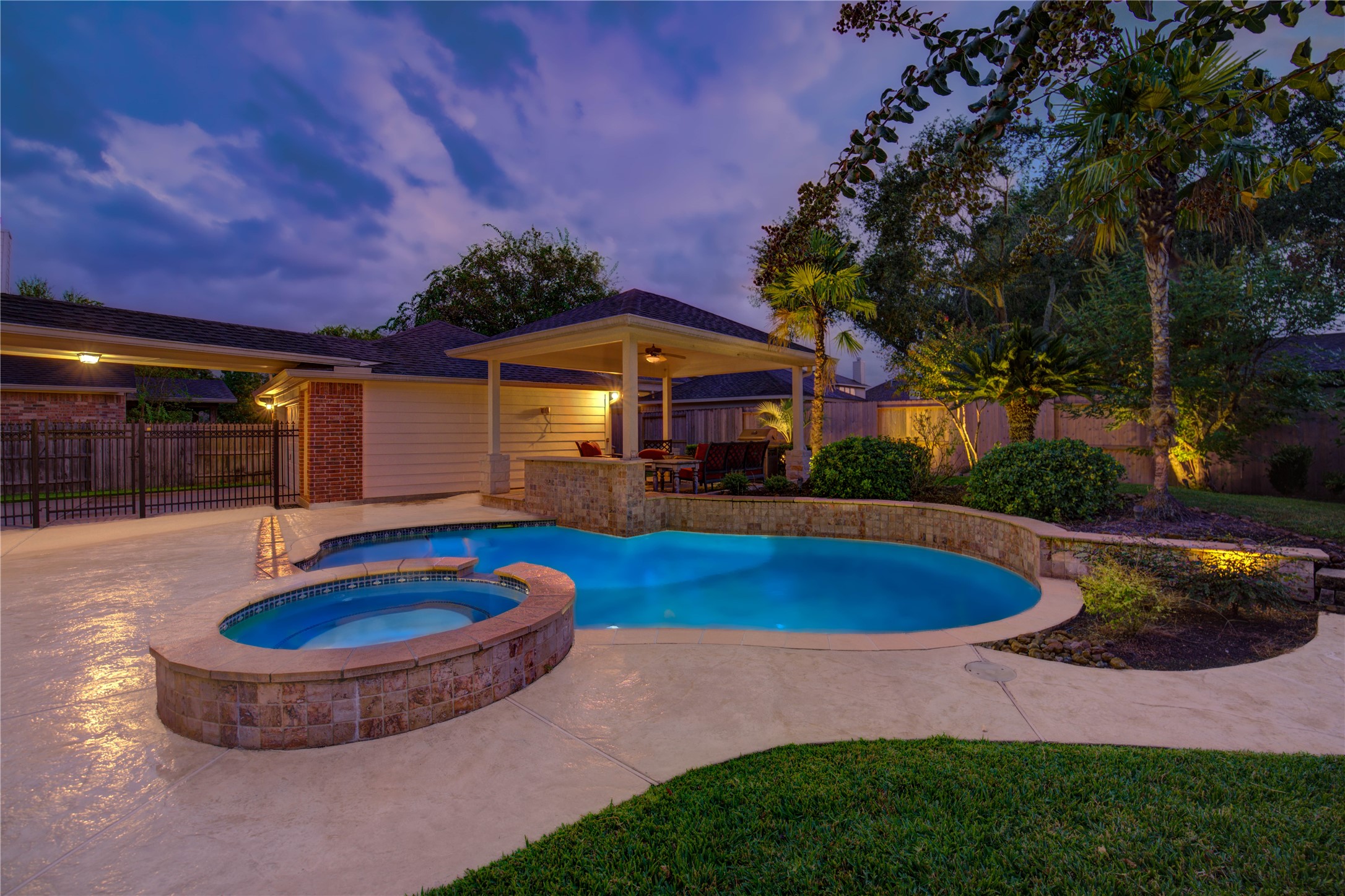 7207 Fiesta Flower Katy, TX 77494 - Photo 3 of 37 This outdoor retreat is designed for year-round enjoyment, featuring a sparkling tropical pool, beautiful hardscaping, and a picturesque gazebo for lounging or dining al fresco.