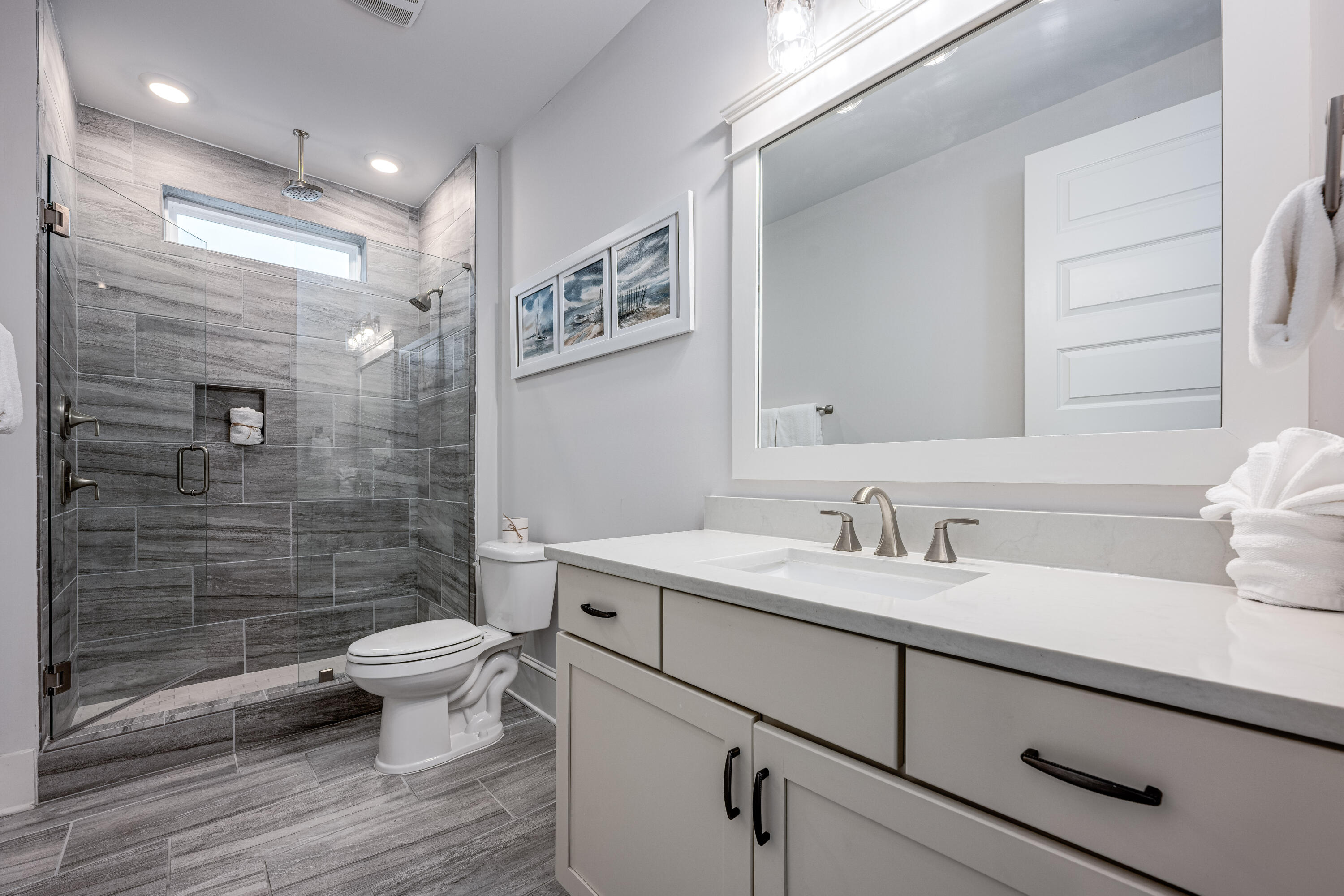 161 Siasconset Ln Inlet Beach Inlet Beach, FL 32461 - Photo 32 of 46 a bathroom with a toilet sink and mirror