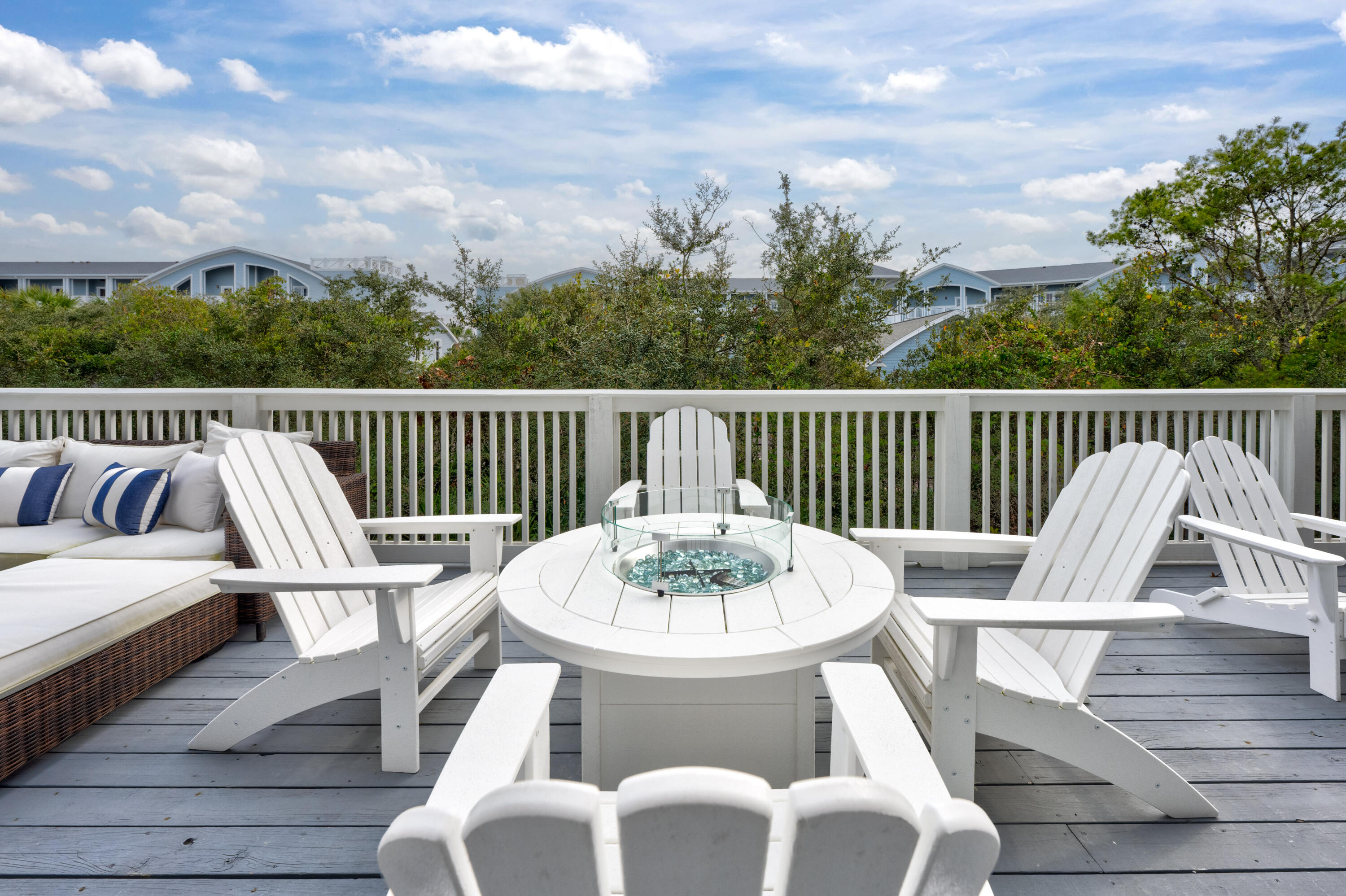 161 Siasconset Ln Inlet Beach Inlet Beach, FL 32461 - Photo 36 of 46 a view of a chair and tables in the roof deck