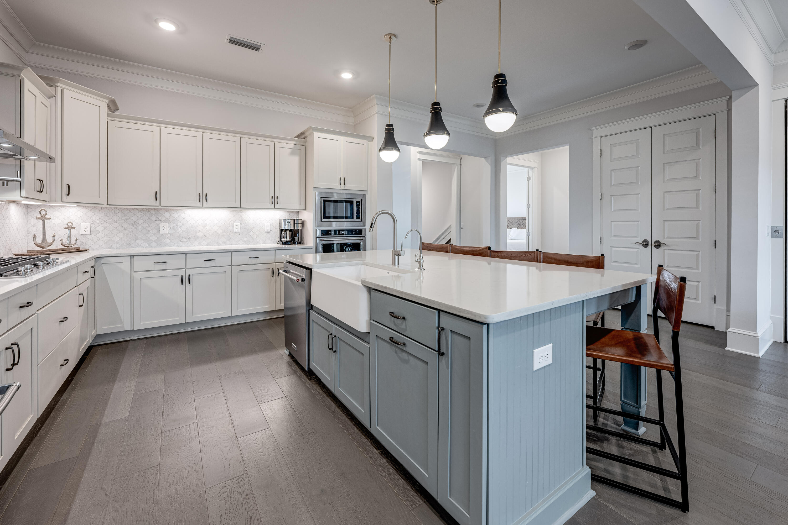 161 Siasconset Ln Inlet Beach Inlet Beach, FL 32461 - Photo 5 of 46 a kitchen with granite countertop a sink a counter space appliances and cabinets