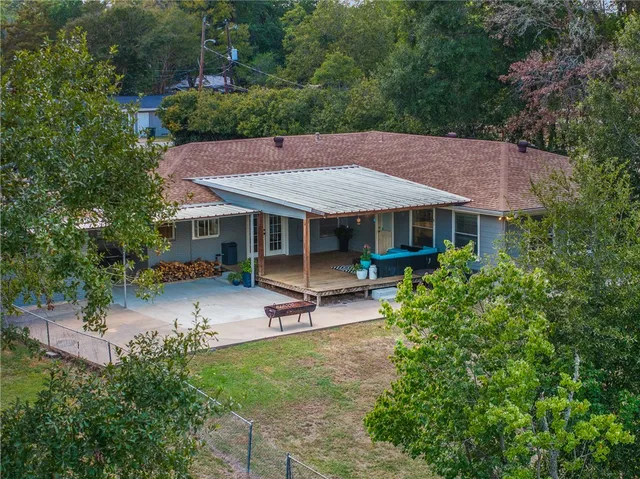 a view of field with trees