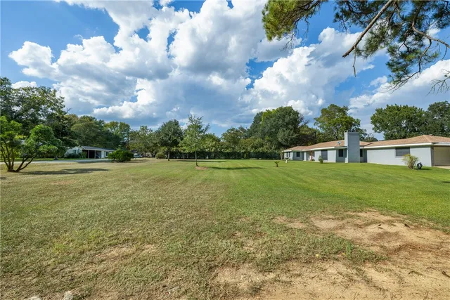 a view of a backyard with a garden