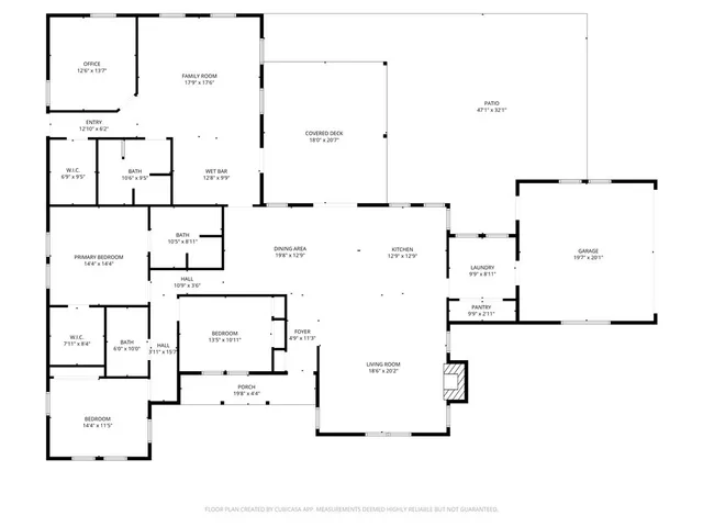 a view of a lake with houses in back