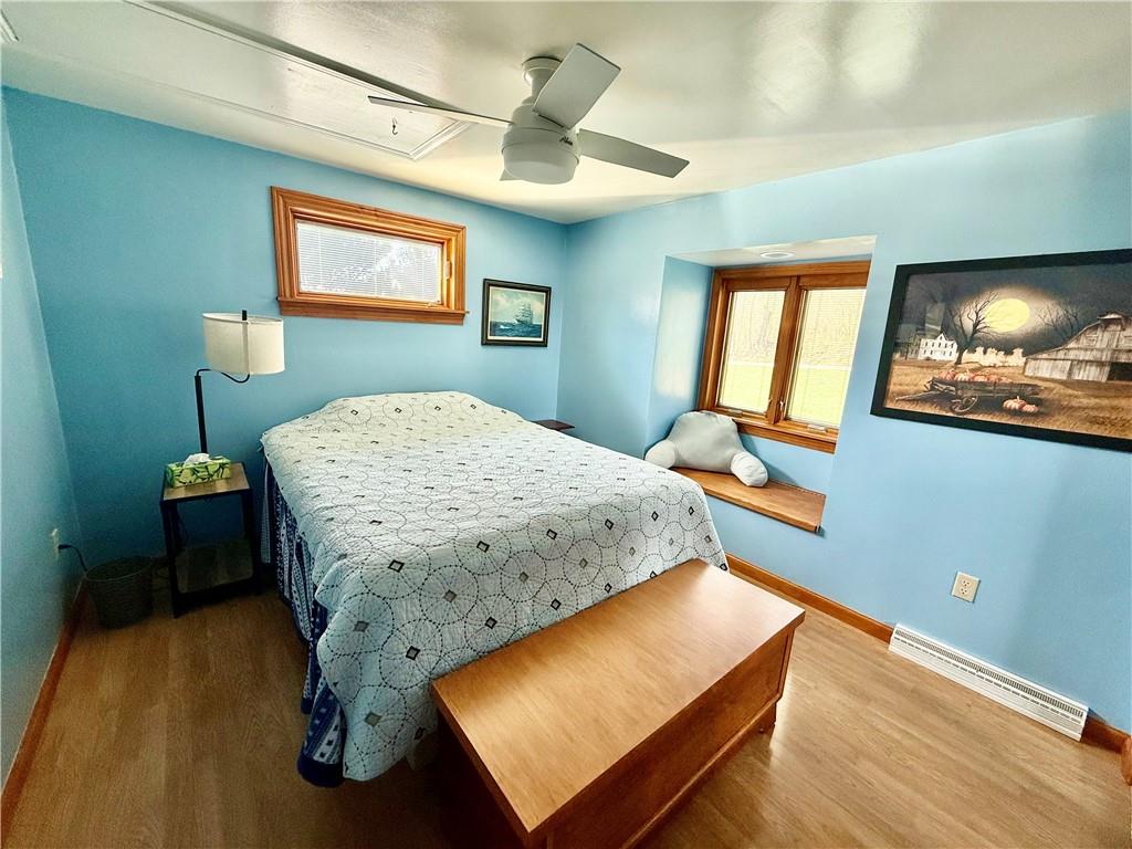 198 Leslie Road Valencia, PA 16059 - Photo 12 of 43 a bedroom with a bed and a flat screen tv