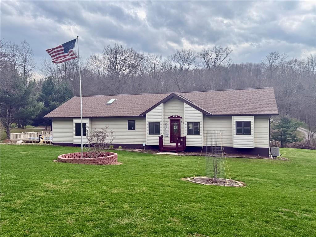 198 Leslie Road Valencia, PA 16059 - Photo 3 of 43 a front view of house with yard and green space