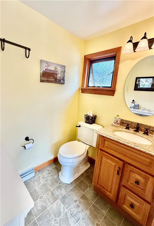 198 Leslie Road Valencia, PA 16059 - Photo 38 of 43 a bathroom with a granite countertop sink mirror vanity and toilet