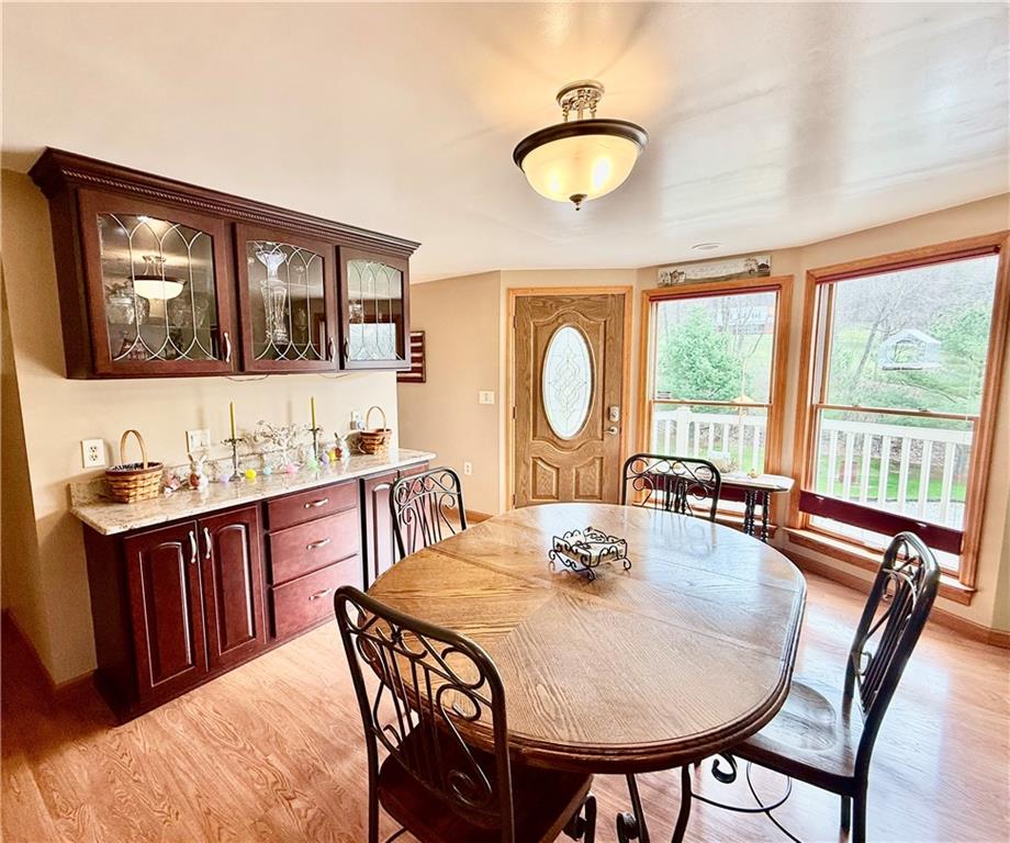 198 Leslie Road Valencia, PA 16059 - Photo 39 of 43 a view of a dining room with furniture window and wooden floor