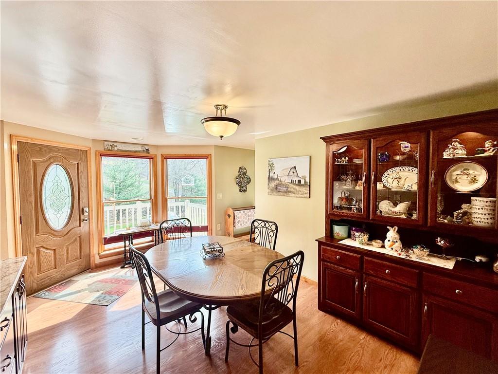 198 Leslie Road Valencia, PA 16059 - Photo 41 of 43 a view of a dining room with furniture window and outside view