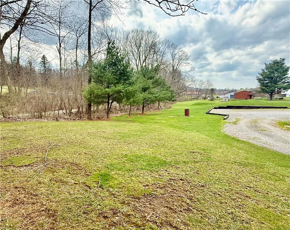198 Leslie Road Valencia, PA 16059 - Photo 7 of 43 a view of a water with a building in the background