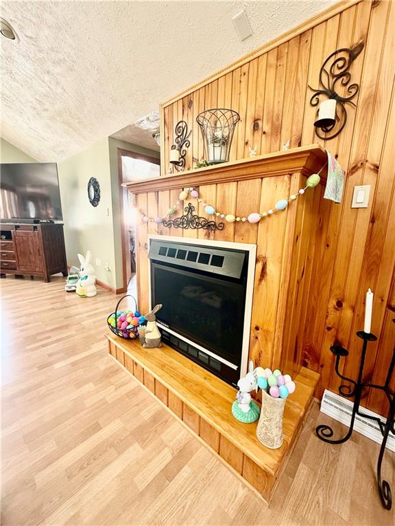 198 Leslie Road Valencia, PA 16059 - Photo 10 of 43 a living room with a fireplace furniture and a rug