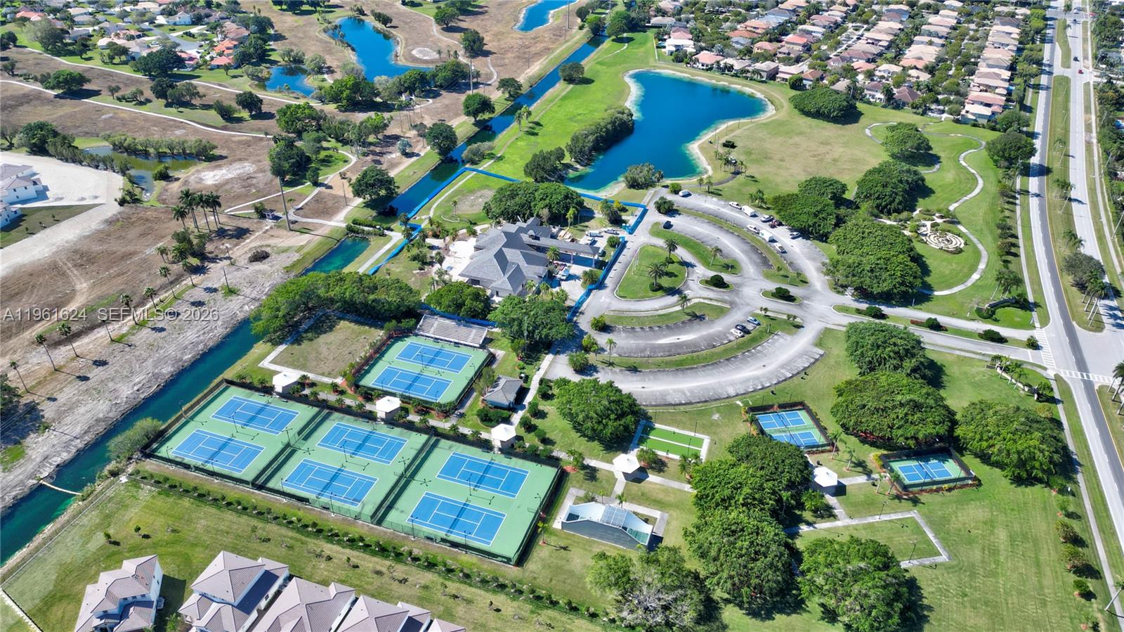2728 Southeast 24th Court Homestead, FL 33035 - Photo 2 of 18 an aerial view of residential house with outdoor space and swimming pool