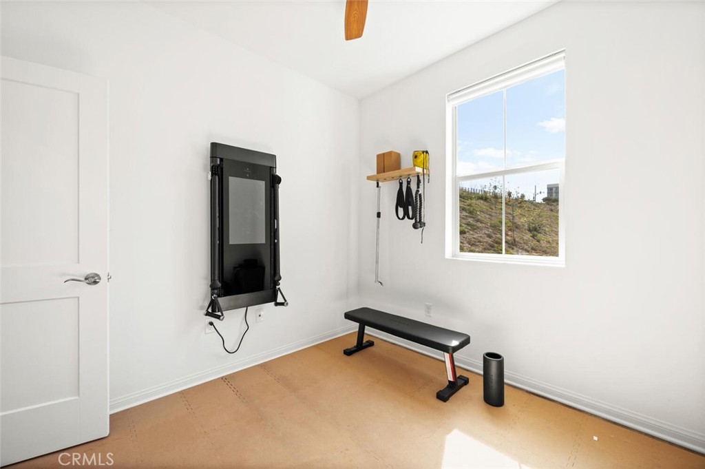 1852 Red Willow Way Oceanside, CA 92056 - Photo 24 of 52 a room with gym equipment and a window