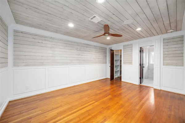 a bathroom with a sink vanity and a mirror