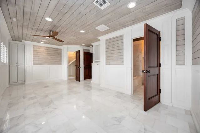 a bathroom with a bathtub and shower