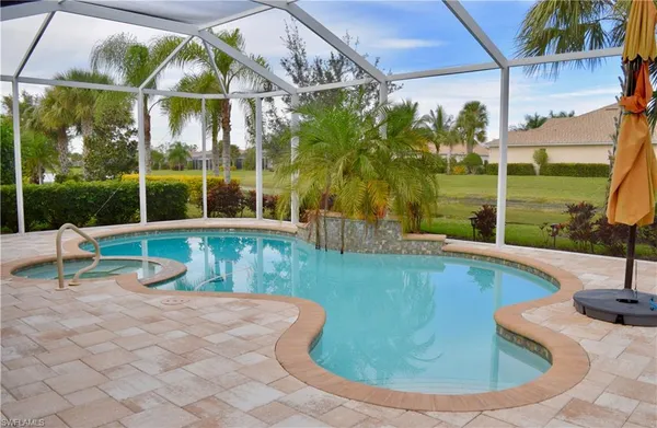 a view of a swimming pool with a sitting space