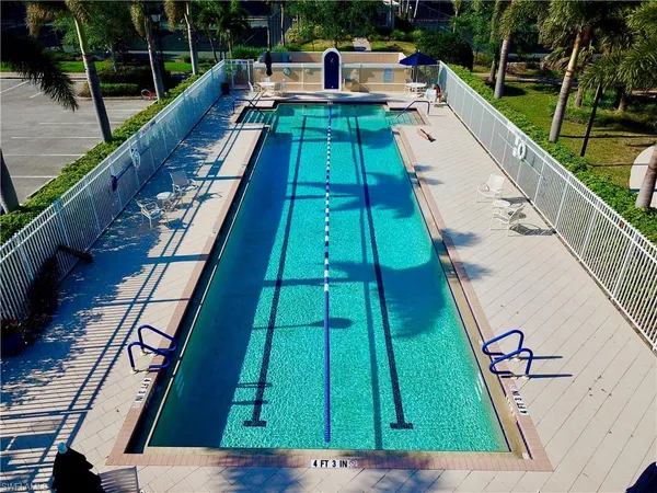 a view of swimming pool with a patio