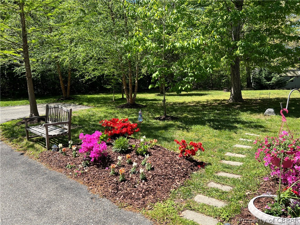 48 Fairfield Road Hartfield, VA 23071 - Photo 3 of 34 Property is adorned with Perennials and Azaleas