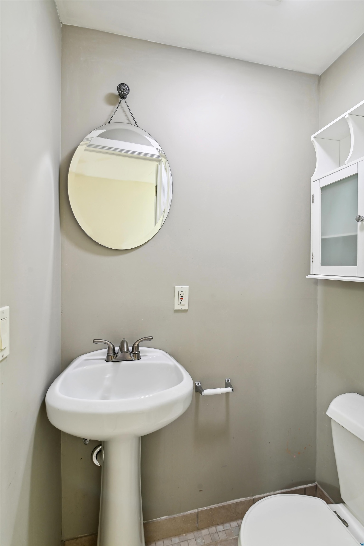 8 Carroll Place Weehawken, NJ 07086 - Photo 14 of 21 a bathroom with a sink a toilet and mirror