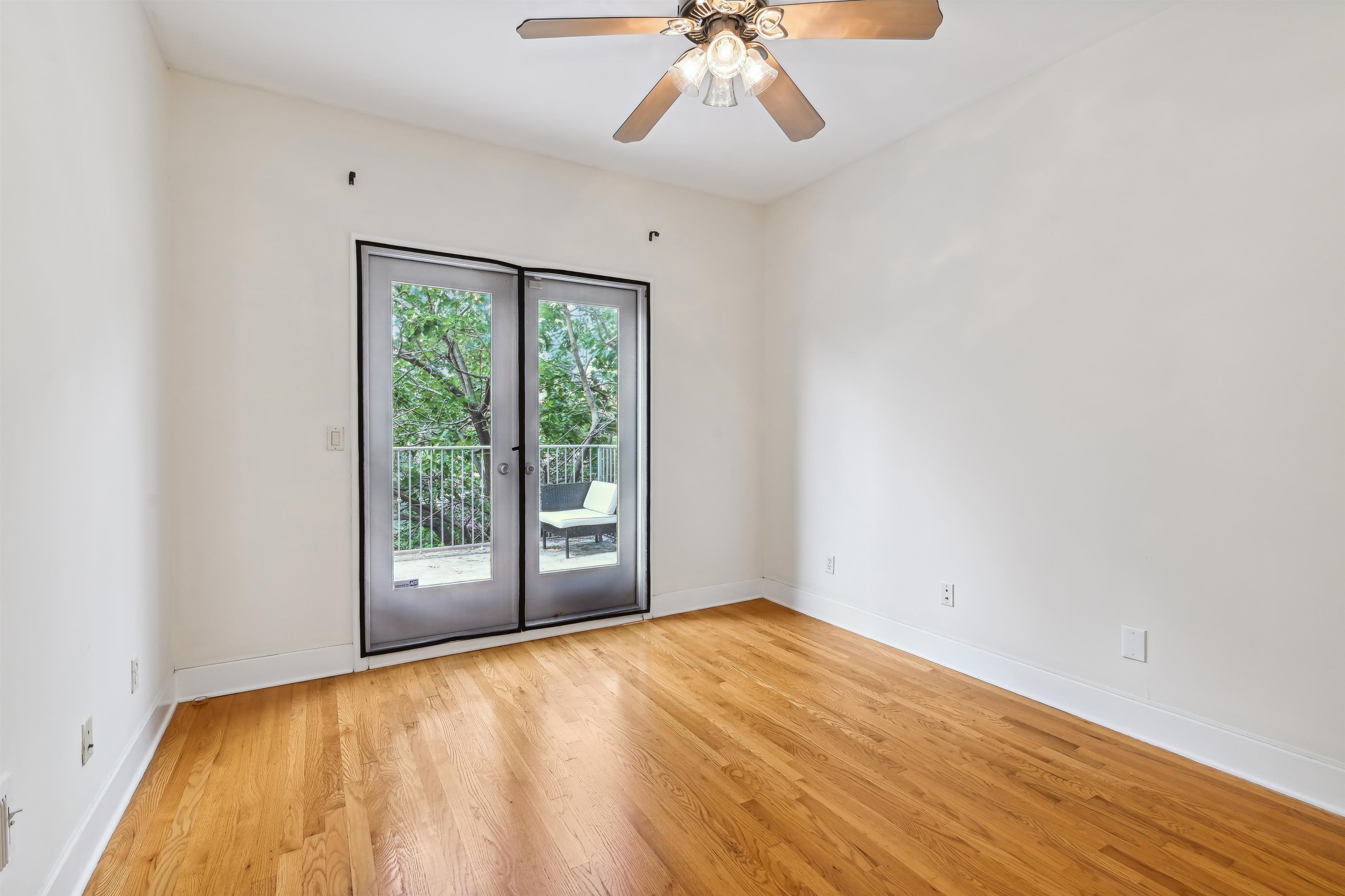 8 Carroll Place Weehawken, NJ 07086 - Photo 8 of 21 a view of an empty room with a window