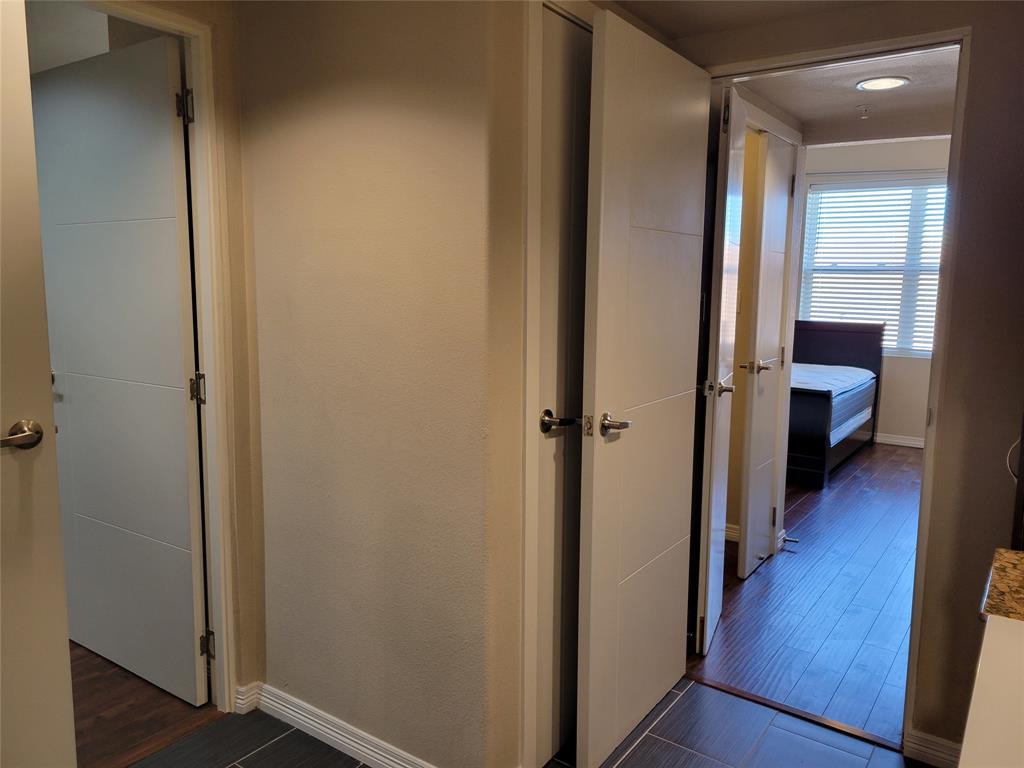 1100 Trinity Mills, Unit 2005 Carrollton, TX 75006 - Photo 10 of 18 a view of a hallway with the wooden floor