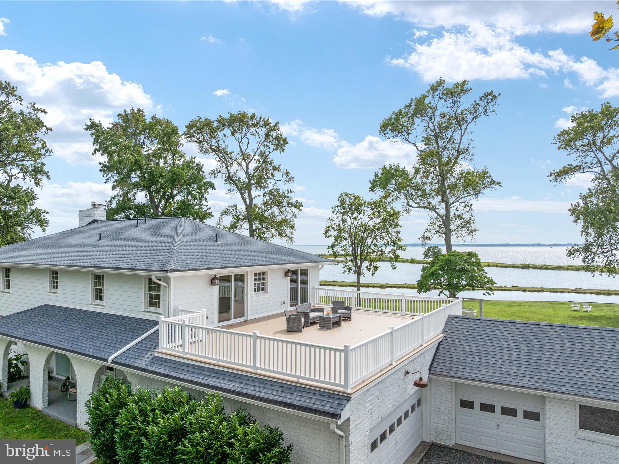 133 Kilby Point Queenstown, MD 21658 - Photo 15 of 87 an aerial view of a house with swimming pool yard and outdoor seating