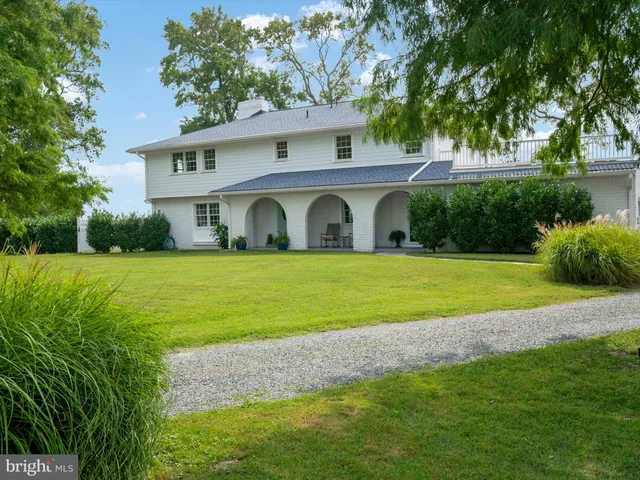 a wooden door with a clock on it