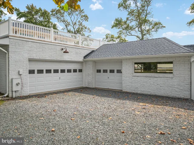 a kitchen with stove a sink and a refrigerator