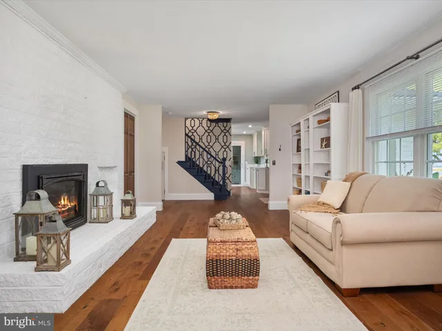 a stove top oven sitting inside of a kitchen