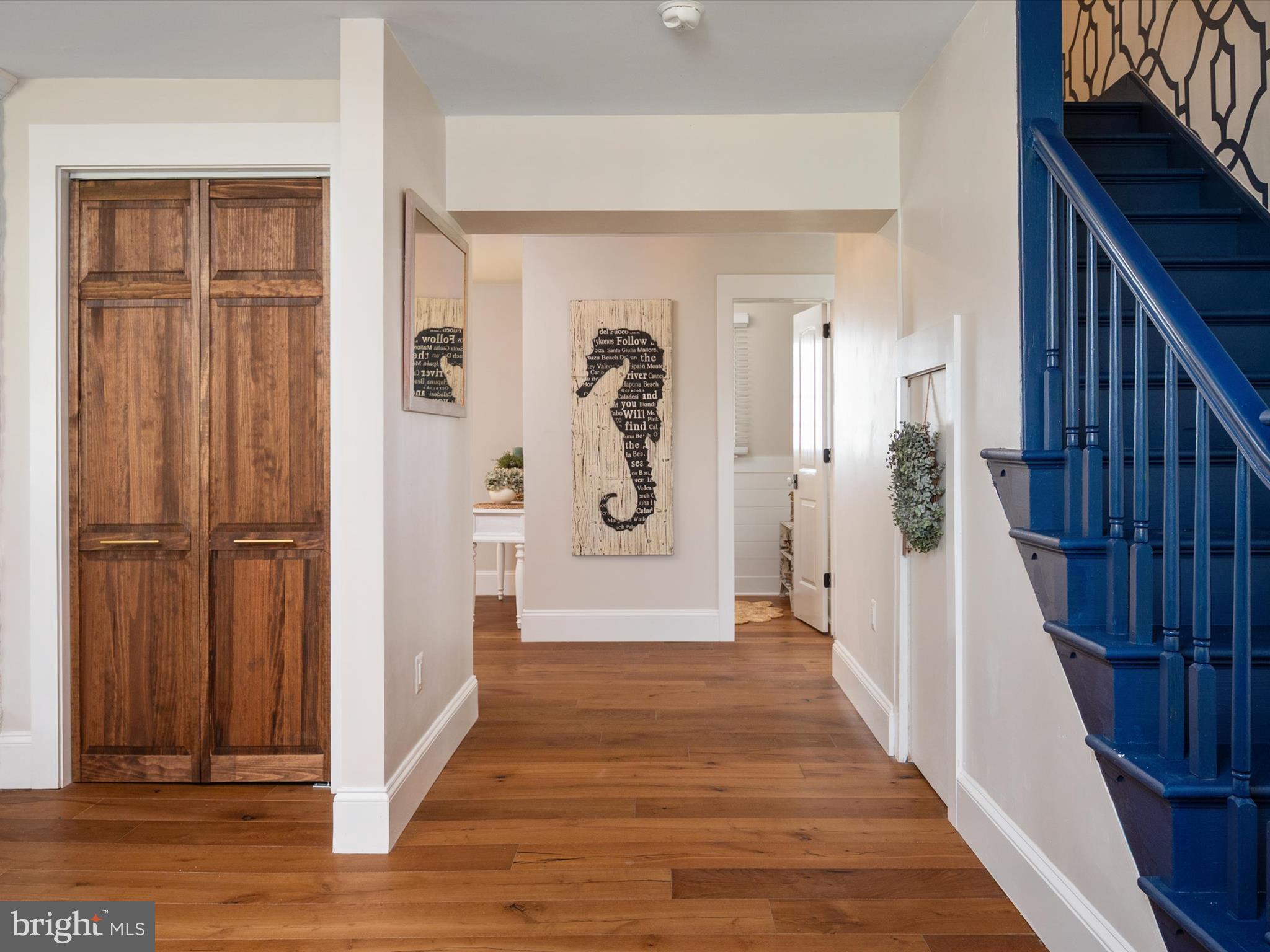133 Kilby Point Queenstown, MD 21658 - Photo 29 of 87 a view of a hallway with wooden floor and stairs
