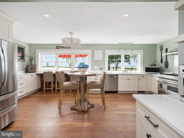 a bedroom with a bed and a desk
