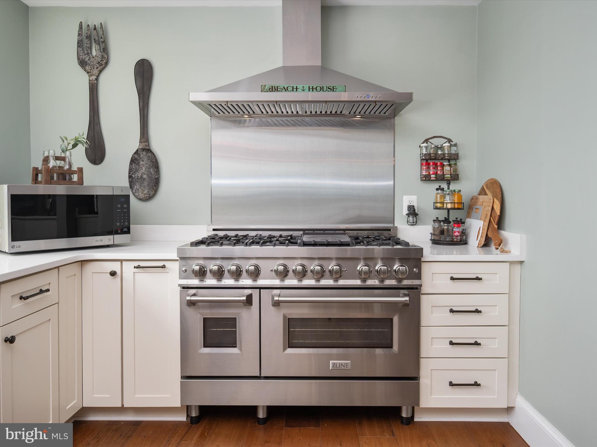133 Kilby Point Queenstown, MD 21658 - Photo 38 of 87 a stove top oven sitting inside of a kitchen