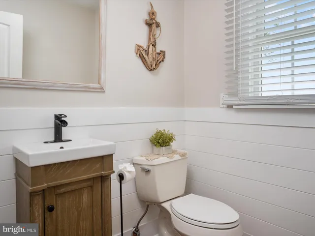 a view of a hallway with washer and dryer