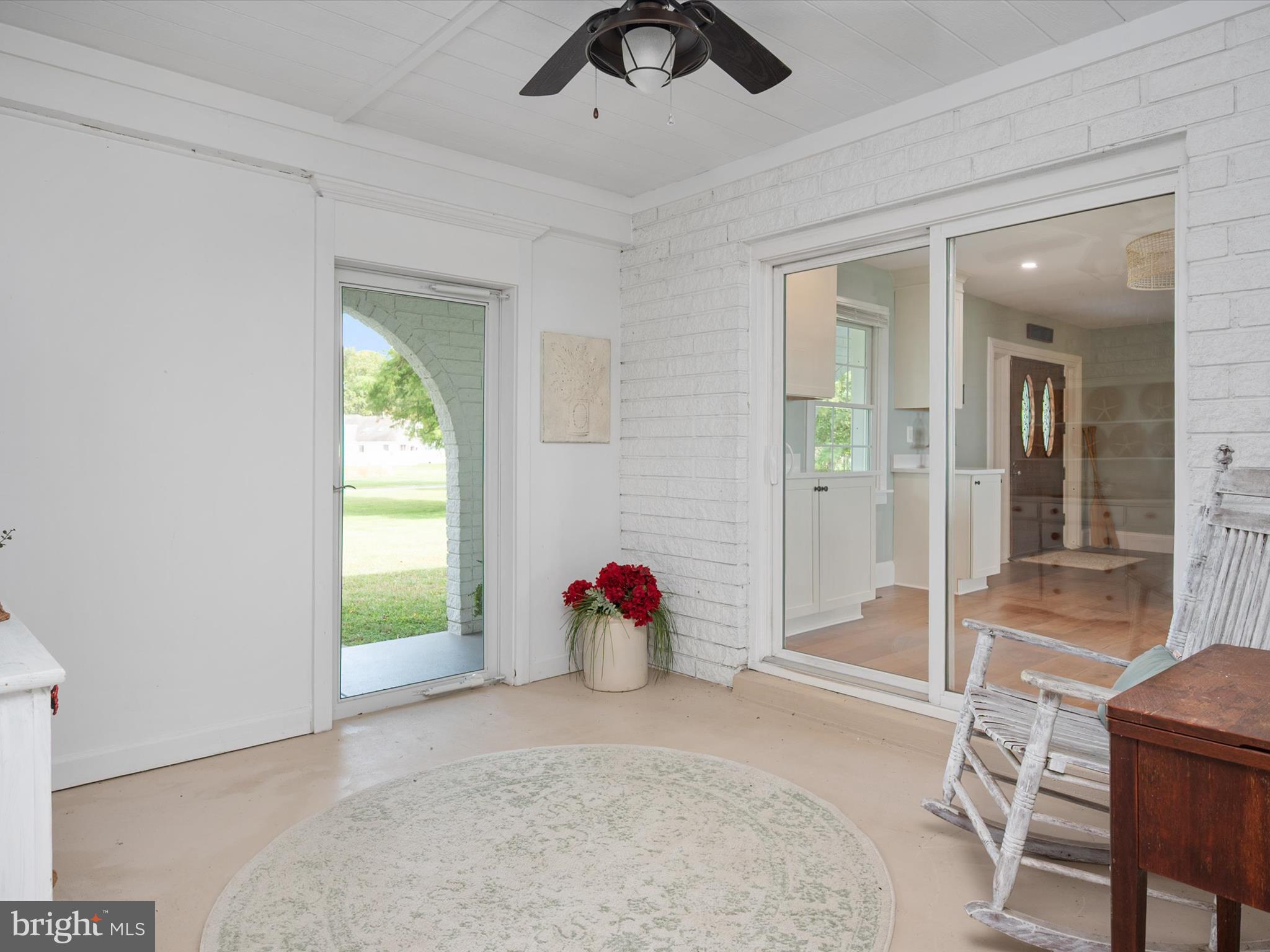 133 Kilby Point Queenstown, MD 21658 - Photo 40 of 87 a bedroom with a bed and chandelier