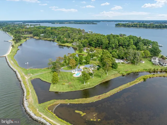 a view of a swimming pool and an outdoor seating