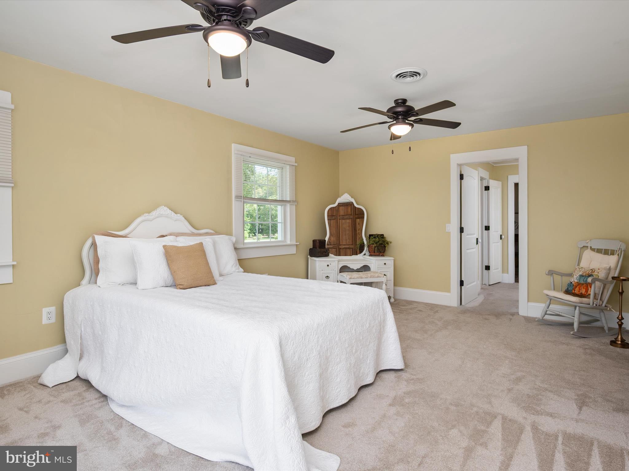 133 Kilby Point Queenstown, MD 21658 - Photo 45 of 87 a bedroom with a bed gym equipment and a ceiling fan