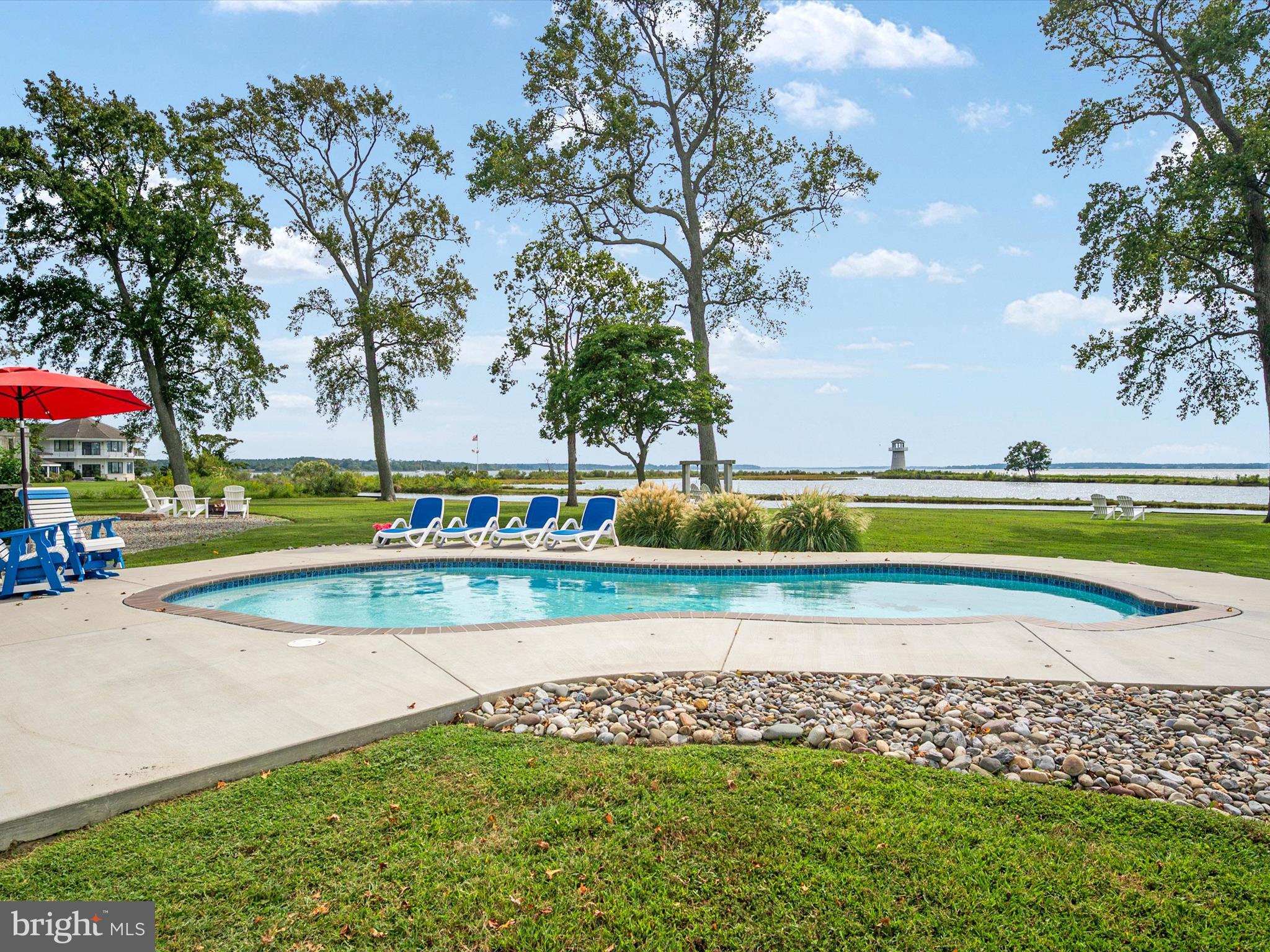 133 Kilby Point Queenstown, MD 21658 - Photo 69 of 87 a view of swimming pool with outdoor seating and garden