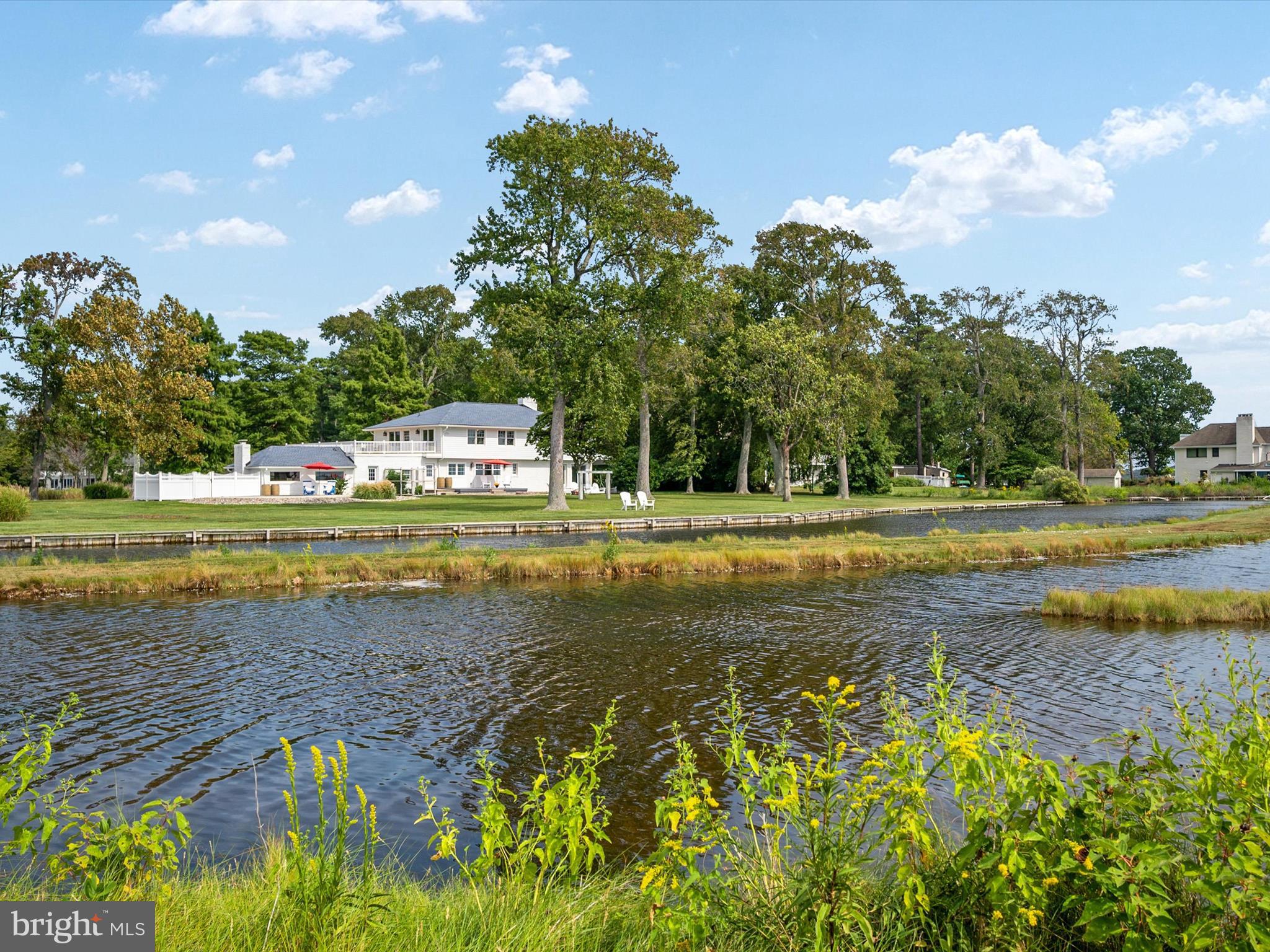 133 Kilby Point Queenstown, MD 21658 - Photo 78 of 87 a view of a swimming pool with an outdoor space and seating area