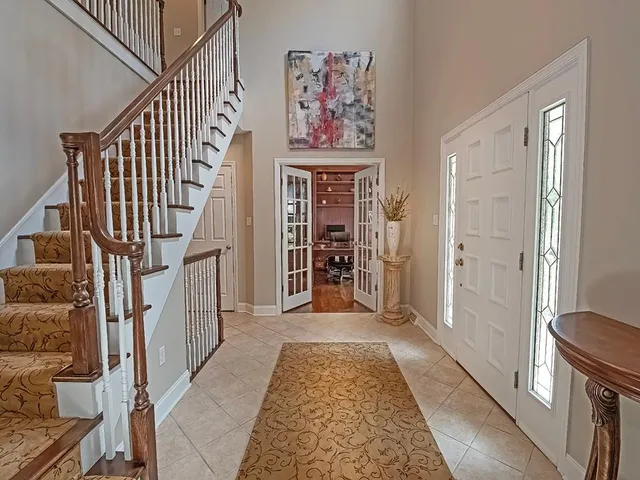 a view of front door with furniture
