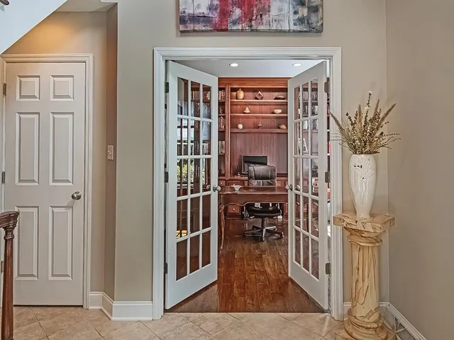 a view of front door with wooden floor