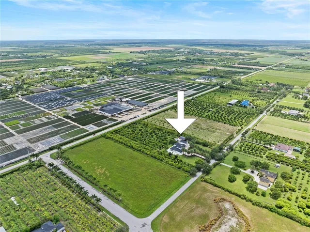 a view of a tennis court of a building