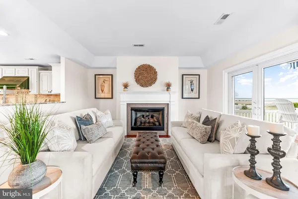 a view of a dining room with furniture wooden floor and a rug