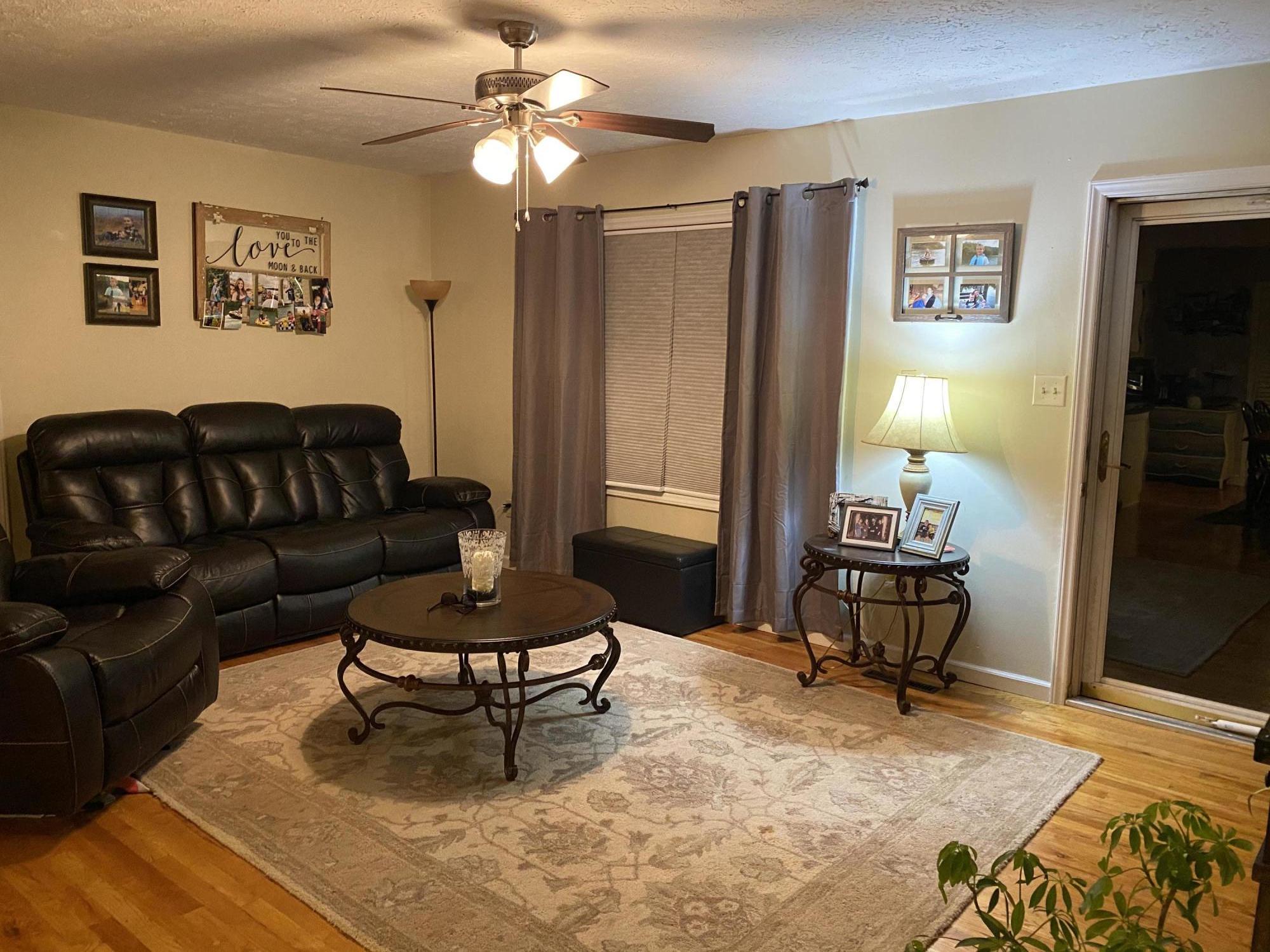 8757 Henry Road Henry, VA 24102 - Photo 12 of 21 a living room with furniture and a rug