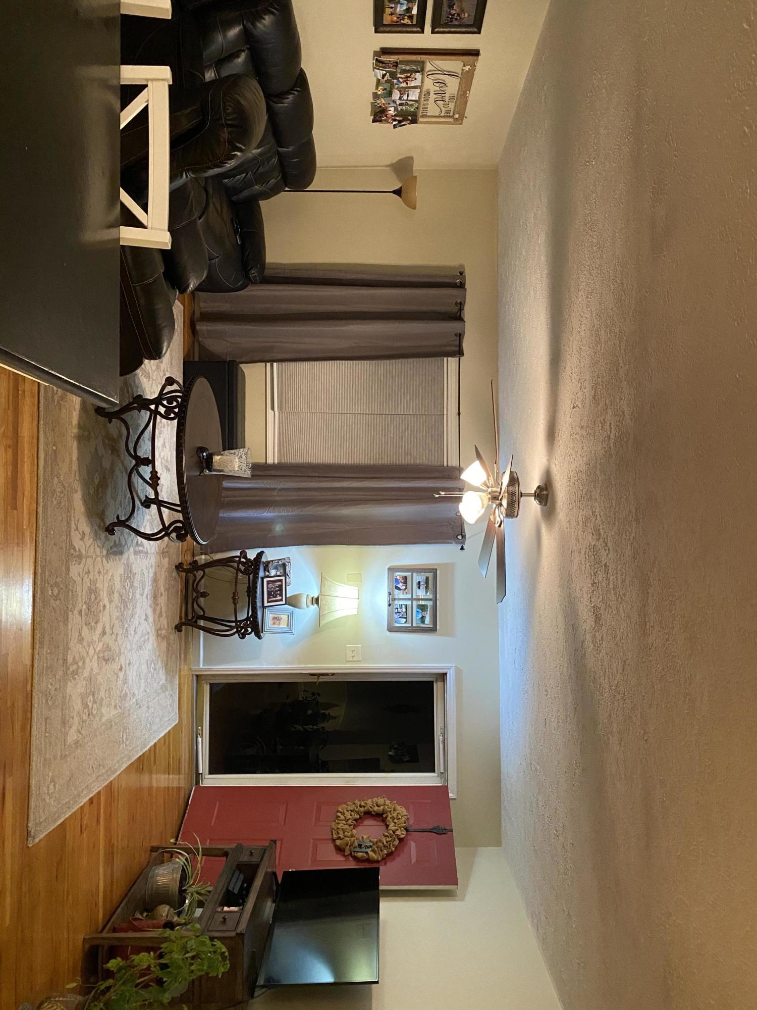 8757 Henry Road Henry, VA 24102 - Photo 20 of 21 a living room with furniture and a fireplace