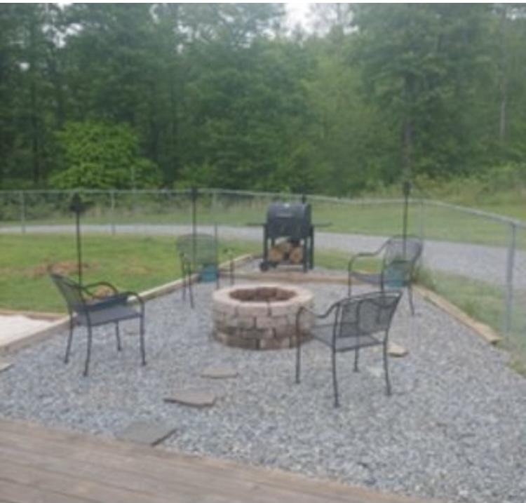 8757 Henry Road Henry, VA 24102 - Photo 3 of 21 a view of a chairs and table in the patio