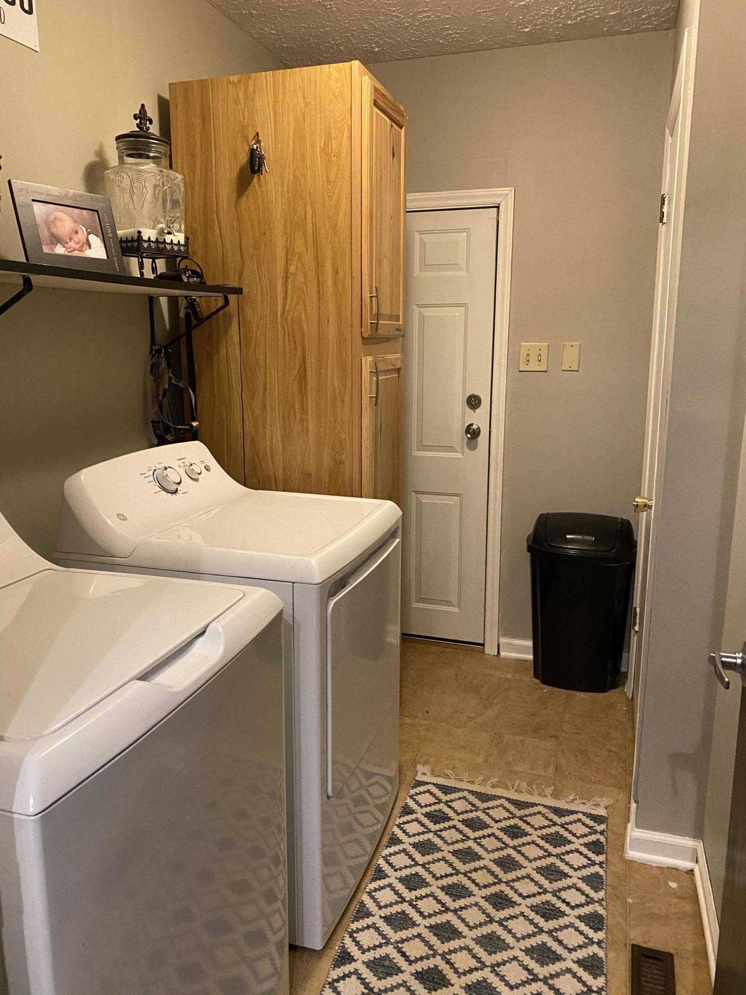 8757 Henry Road Henry, VA 24102 - Photo 8 of 21 a utility room with dryer and washer