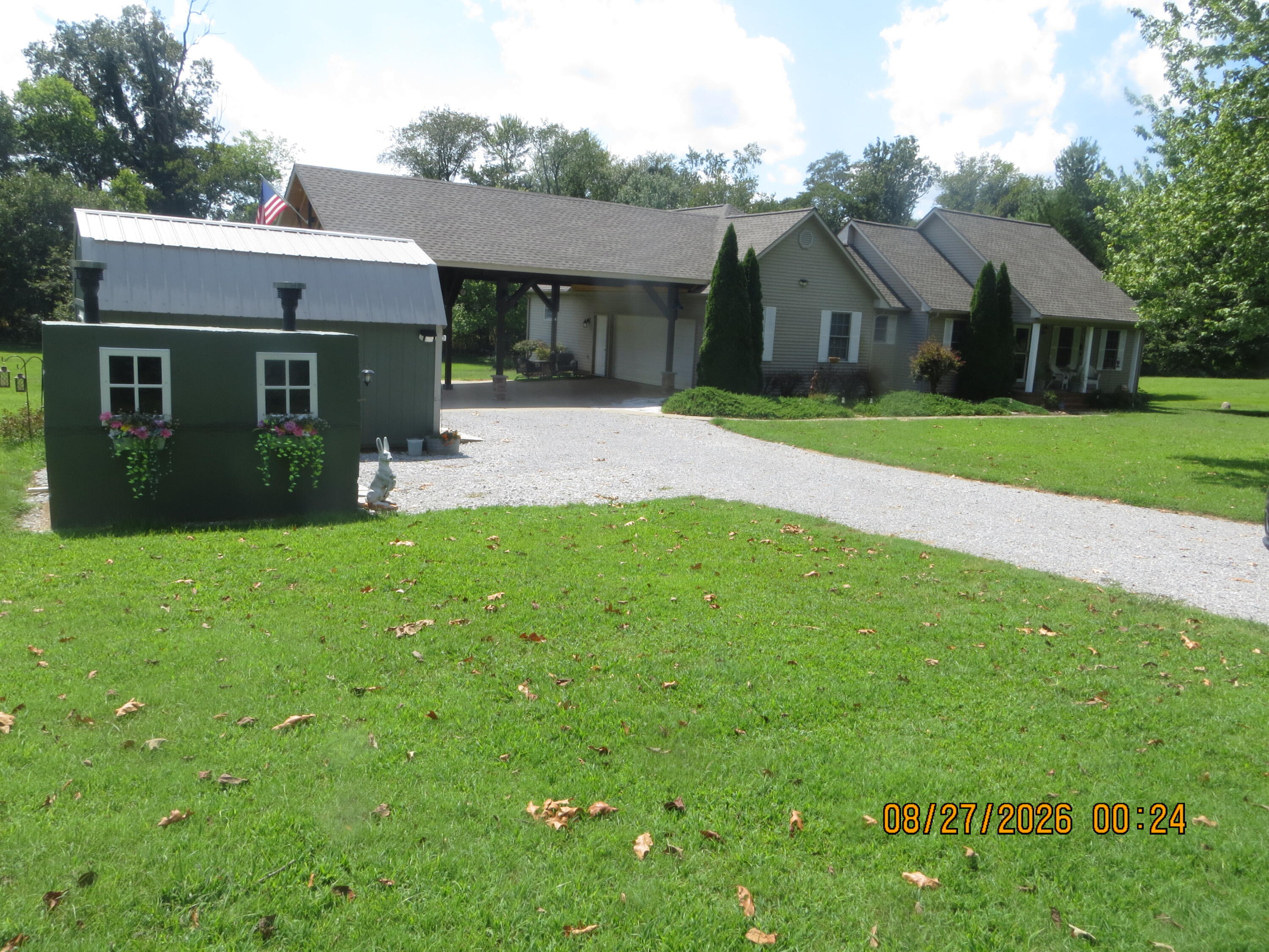 600 East Blanks Road Wickliffe, KY 42087 - Photo 9 of 67 Front of property, showing storm shelter and portable shed on left. Both these items stay with property.