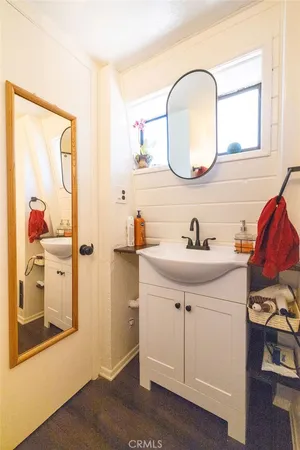 a view of an chairs and table in the balcony