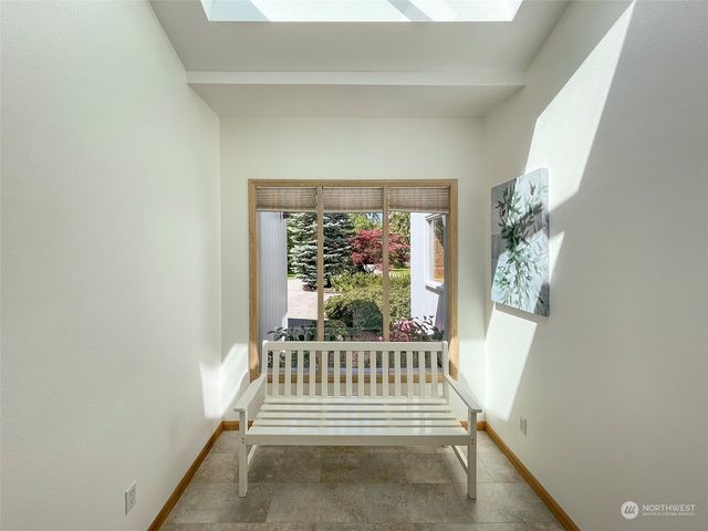 a view of entryway with stairs and wooden floor